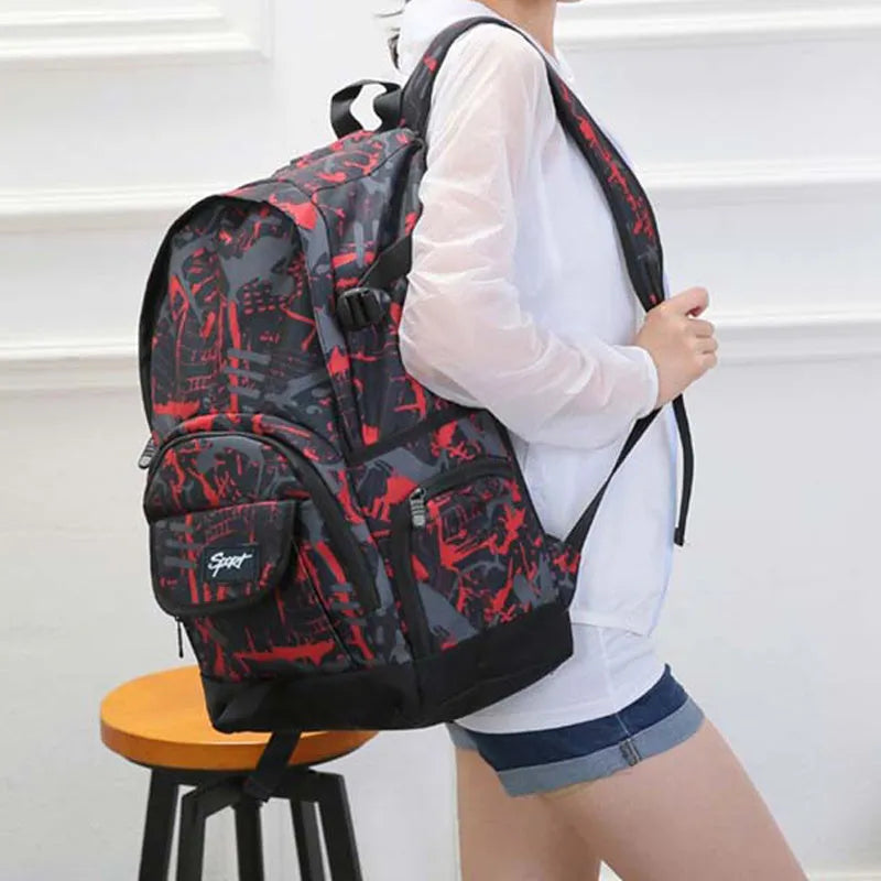 Classic large blue nylon backpack and classic large red nylon backpack side by side.