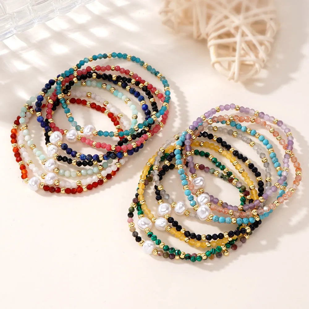 A geometric natural stone bracelet with an ellipse detail, shown in one of fifteen available colour options.