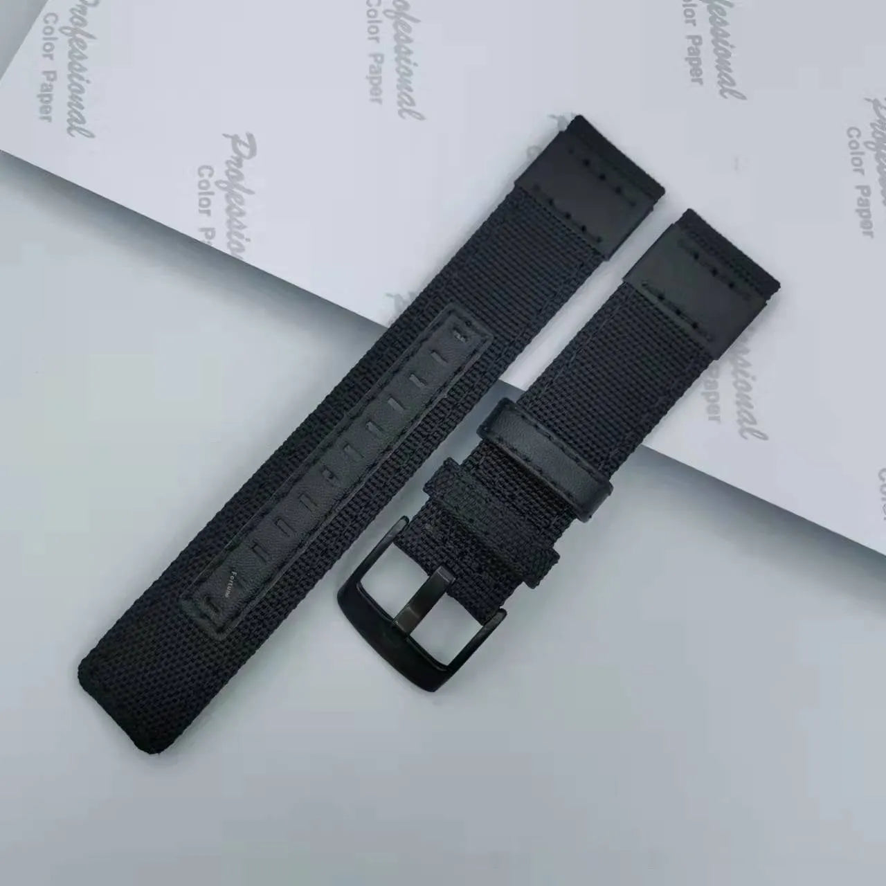 Oxford cloth canvas watch strap in camouflage colour, shown alongside black and blue options.