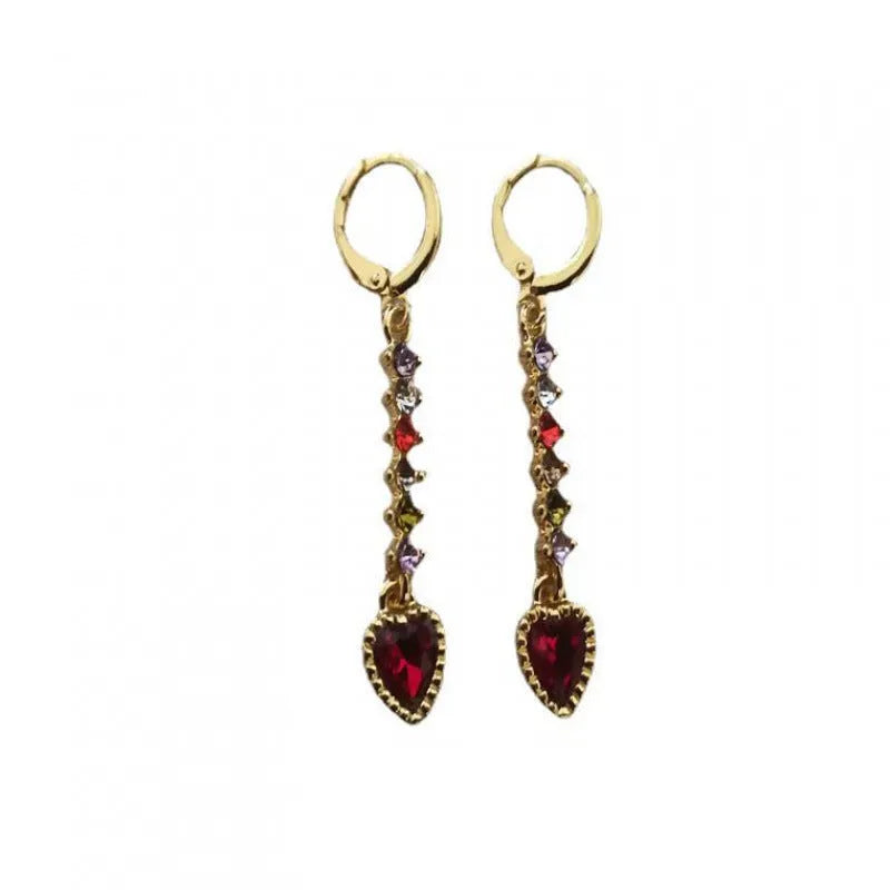 A pair of women's heart-shaped alloy earrings with an electroplated gold or silver finish.