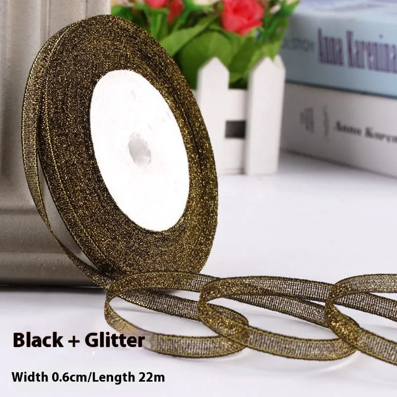 Roll of narrow 0.6cm wide polyester gift wrapping ribbon in assorted colours, showing 22 metre length.