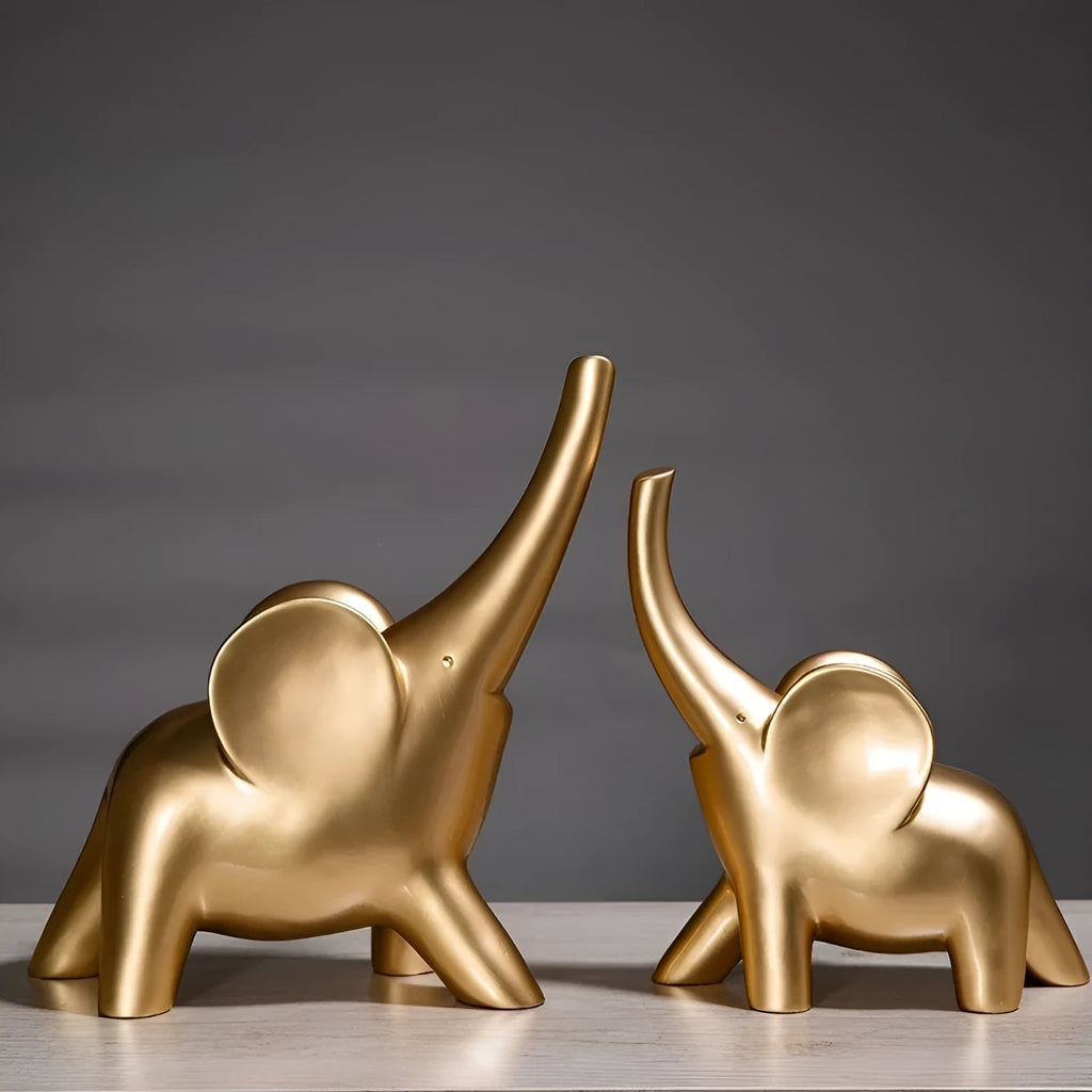 Modern resin elephant ornament in rose gold or white finish, available in large and small sizes