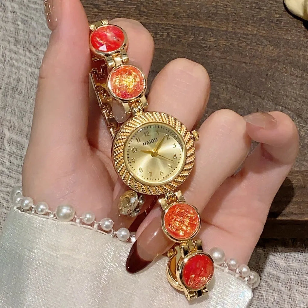 Women's quartz watch with 25mm round dial in one of six colours including milky white and dark green