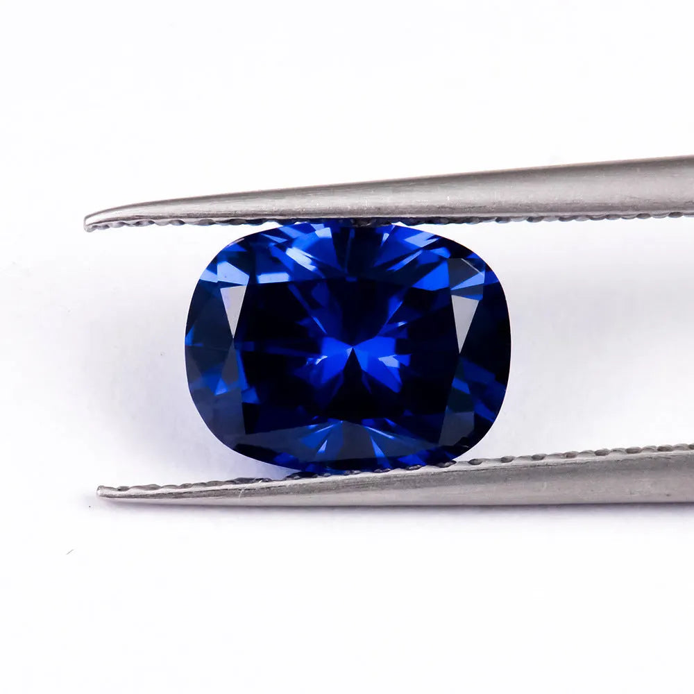 Royal blue love shaped tiara gemstones in various weights and shapes including heart, round, and pear styles