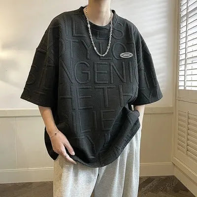 Men's grey retro loose fit T-shirt with raised three-dimensional letter pattern on front