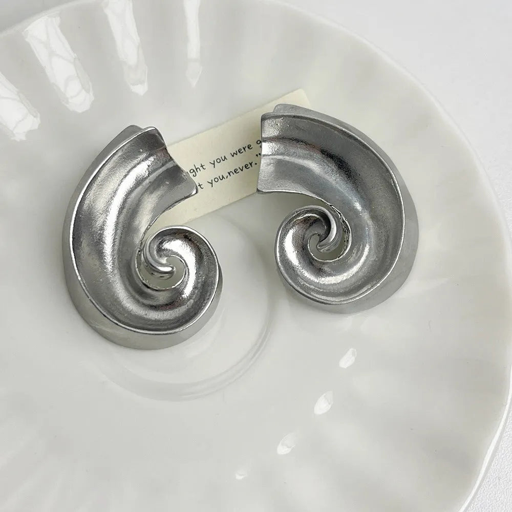 Geometric retro design alloy ear studs in gold or silver colour, 5cm size.