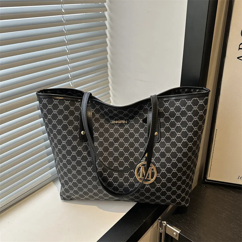 Western style black PU leather shoulder bag with sewing thread details and structured design