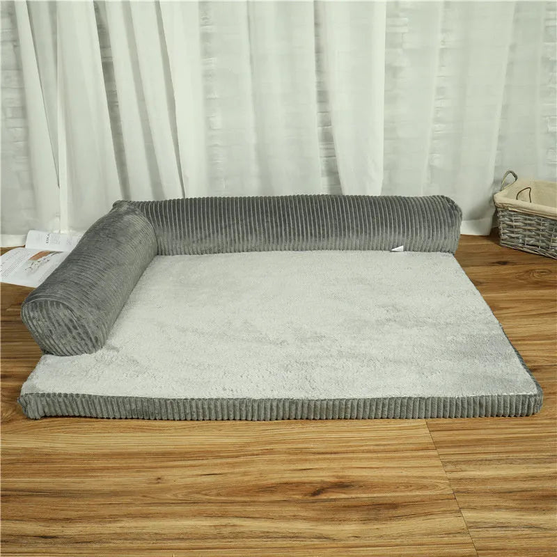 Corduroy pet dog bed sofa in a neutral colour with a raised edge and non-slip base.