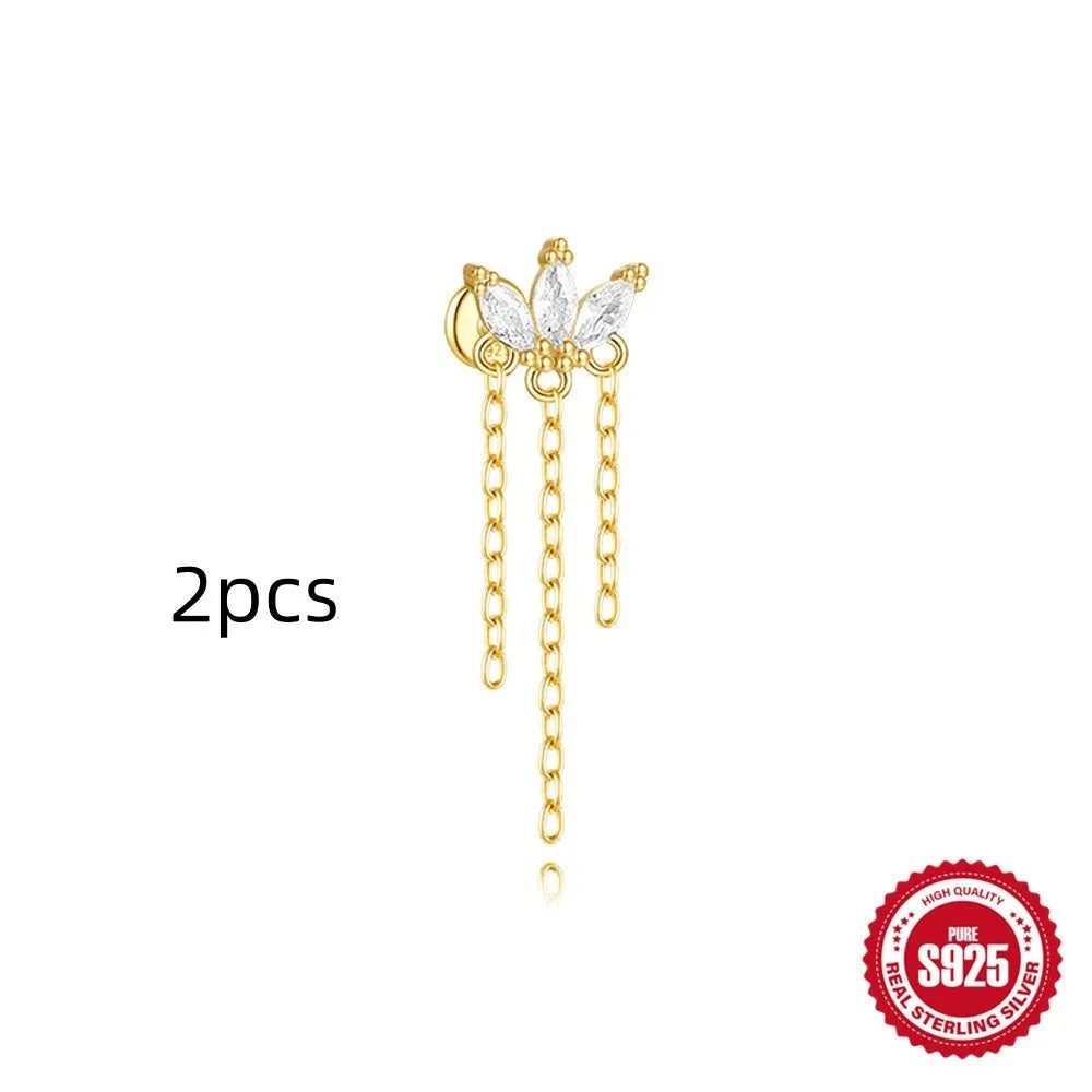 S925 sterling silver geometric kite shaped earrings with chain tassel and rhinestone detailing in gold tone finish