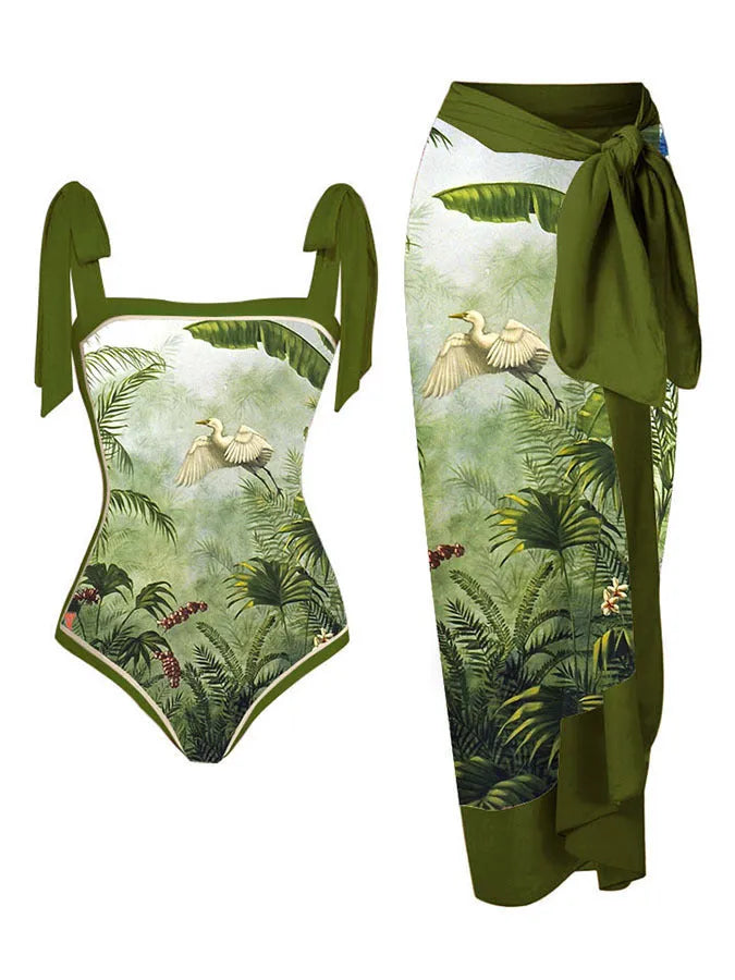 Women's printed chiffon two-piece swimsuit set with a separate hip skirt.