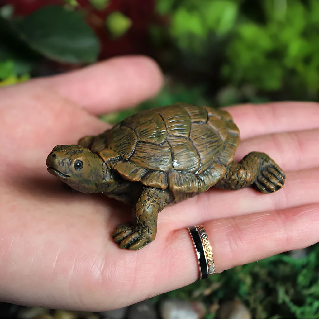 Small brown resin simulation turtle ornament for fairy garden or terrarium decoration.