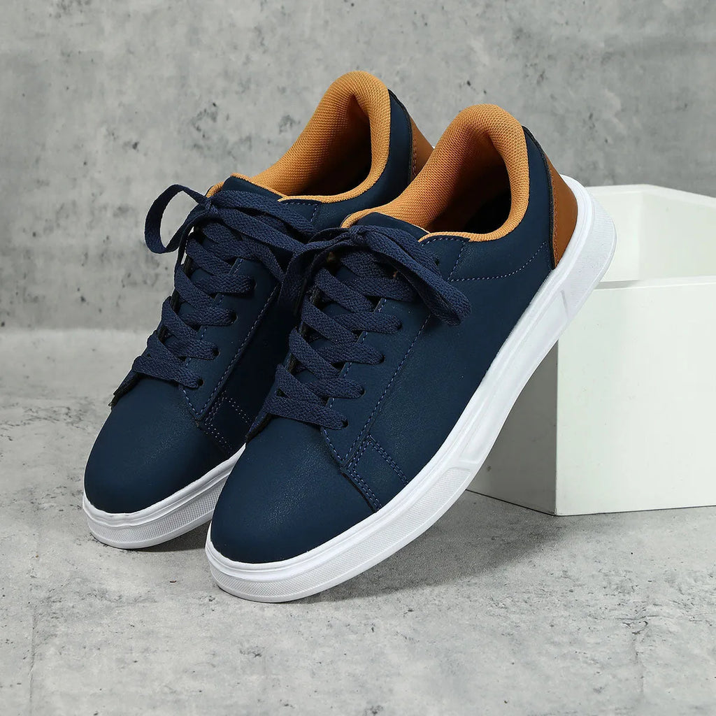 Platform skateboard sneakers in beige brown with cross strap and rubber sole