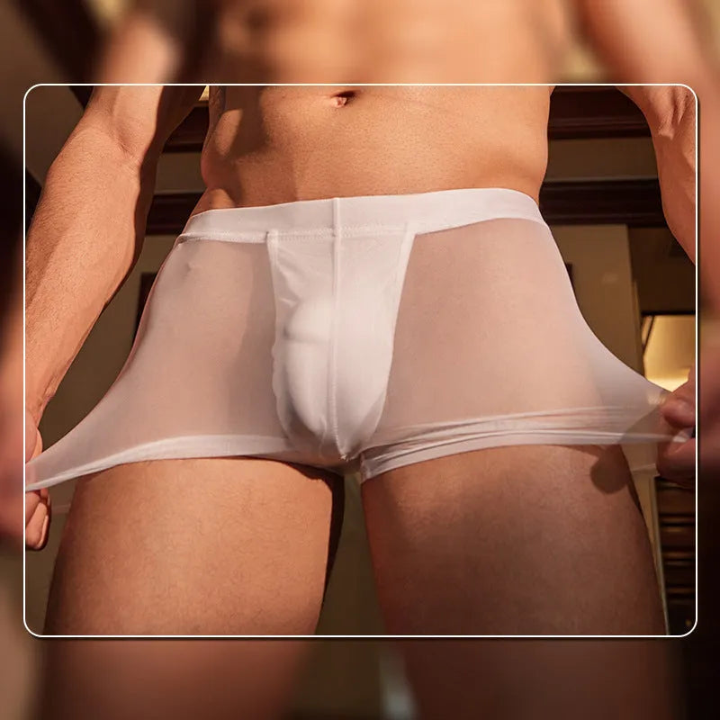 A pair of black ultra-thin men's nylon boxer briefs laid flat, showing their simple design.