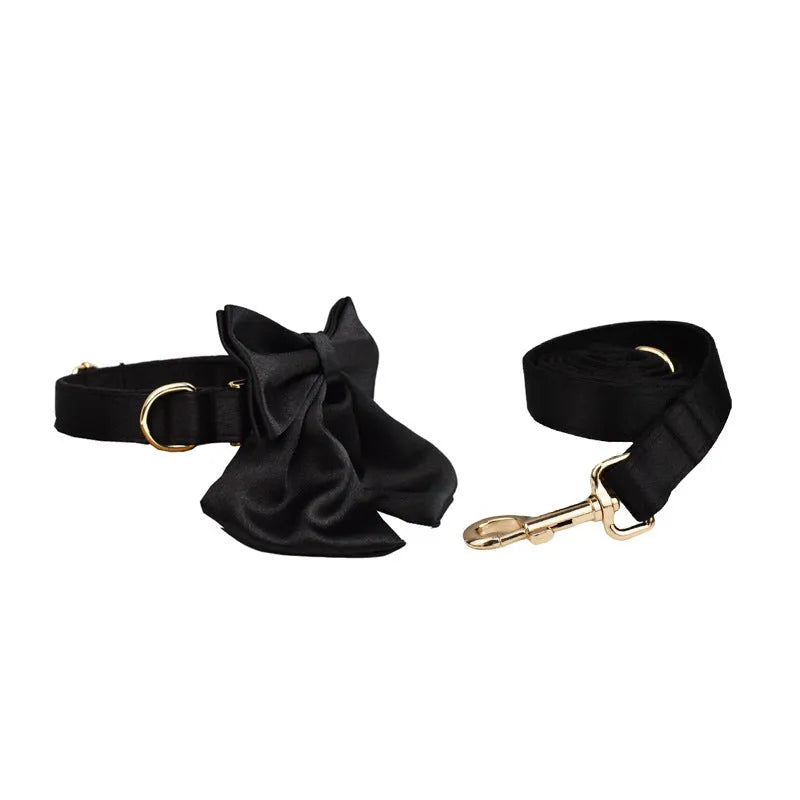 Cloth dog collar, leash, bow, and vest set shown in multiple sizes for pets.
