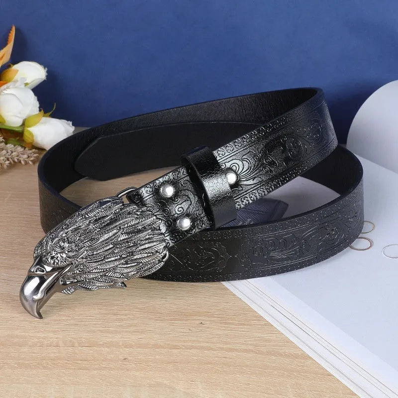 Men's black imitation leather belt with a detailed silver alloy cow head buckle and pin fastening.