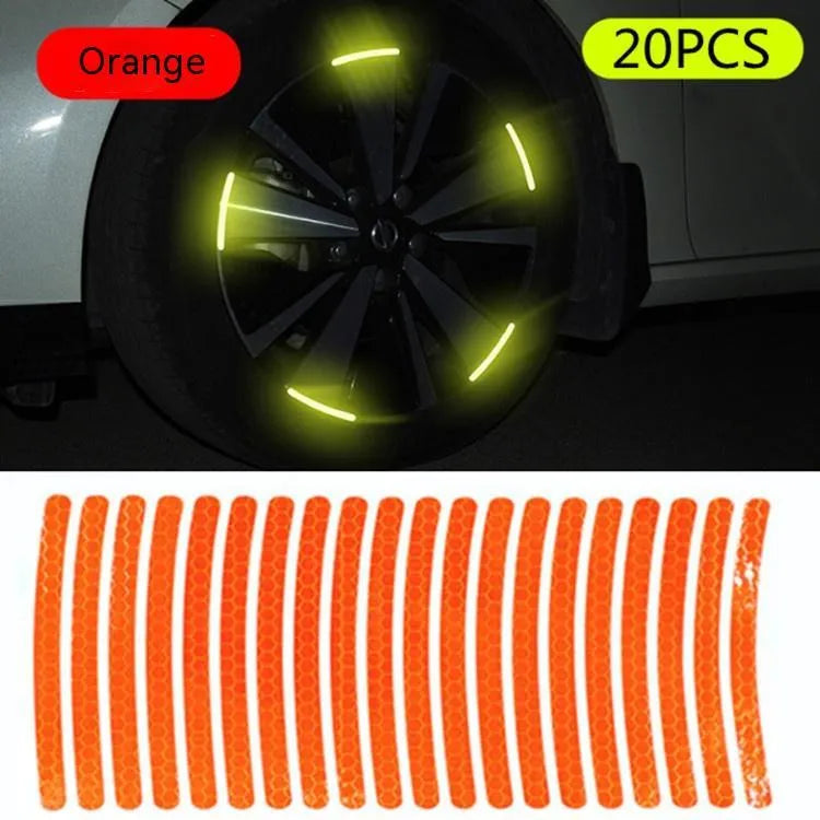 Pack of 20 arc-shaped reflective PVC stickers for car wheel hubs in multiple colours.