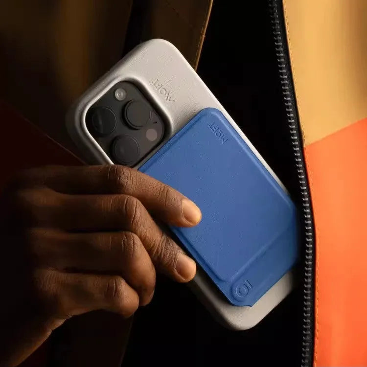 Black magnetic mobile phone holder with MOVAS leather finish, shown from the front.