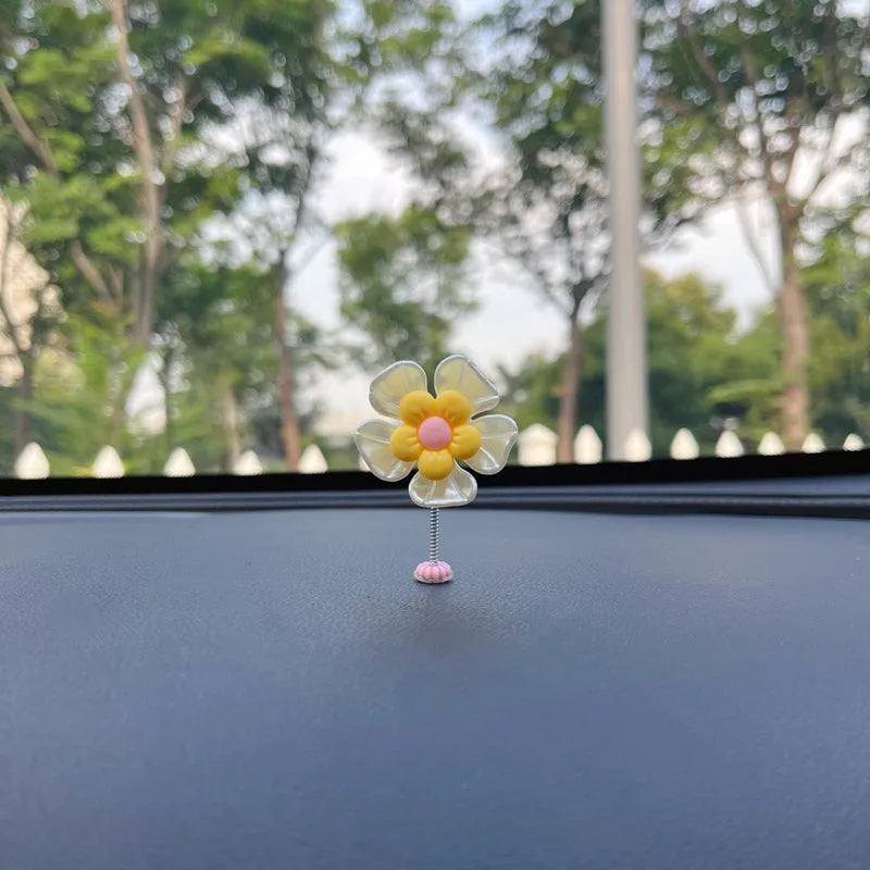 Plastic car swing decoration in choice of five colours measuring 5cm high