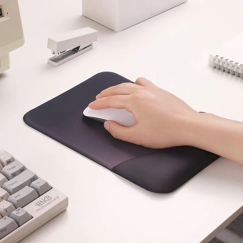 Square silicone wrist support mouse pad with cloth surface measuring 250x180mm