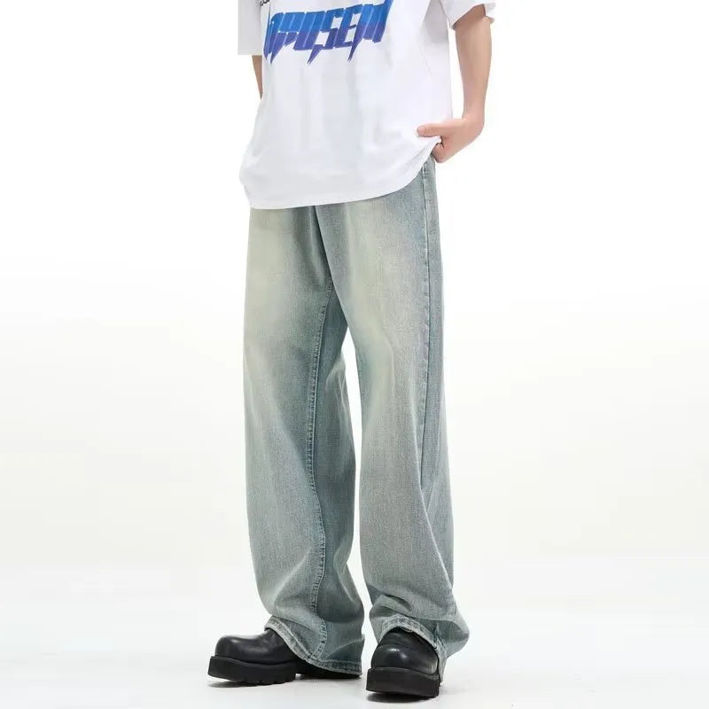 Blue loose-fit retro-style casual trousers with an elastic waistband on a hanger.