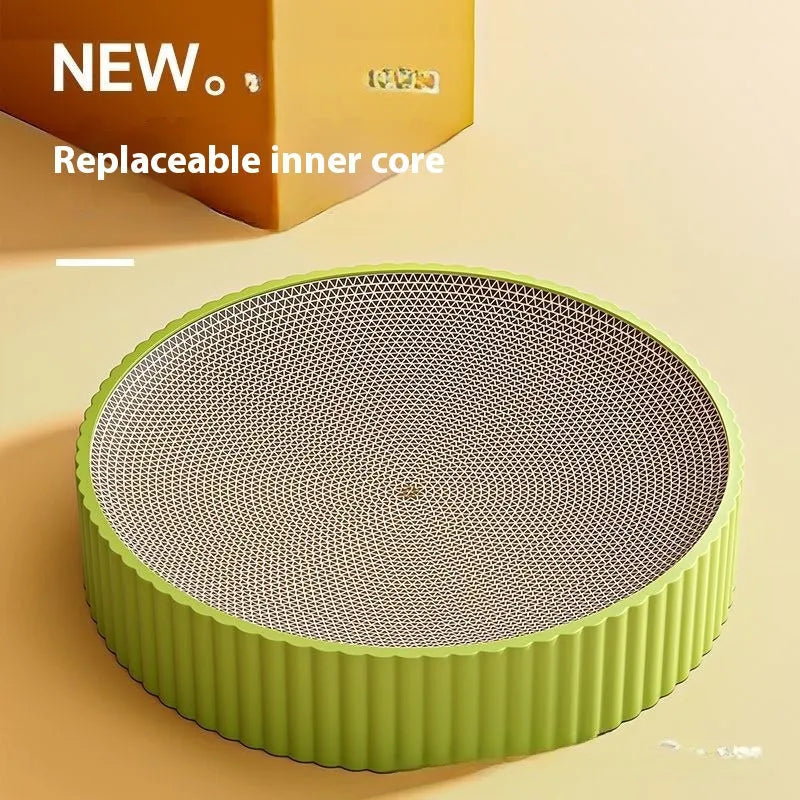 Green round cat scratching board with corrugated paper surface measuring 55 cm diameter