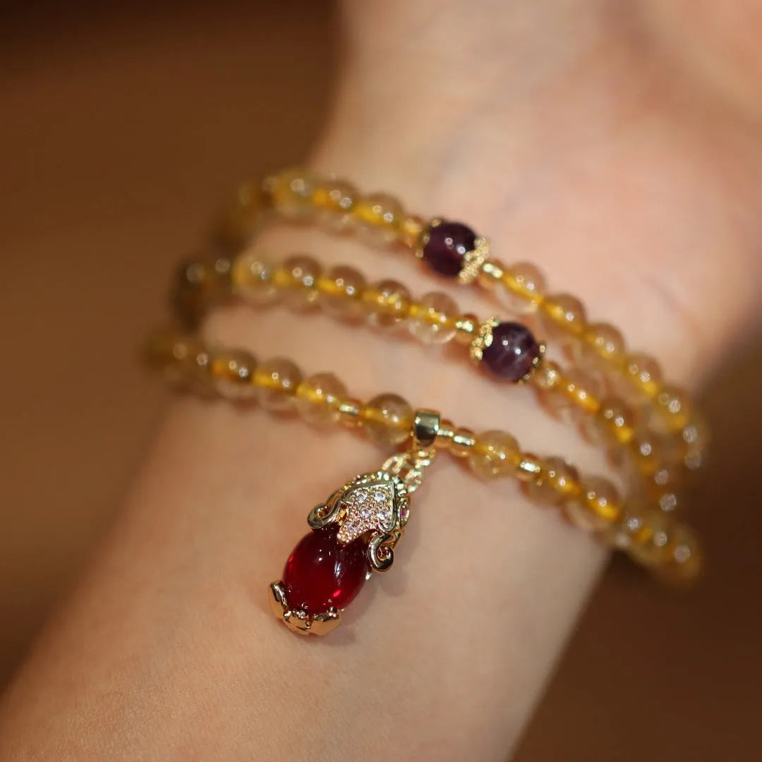 Natural gold rutilated quartz bracelet with three rings Chinese style design on wrist