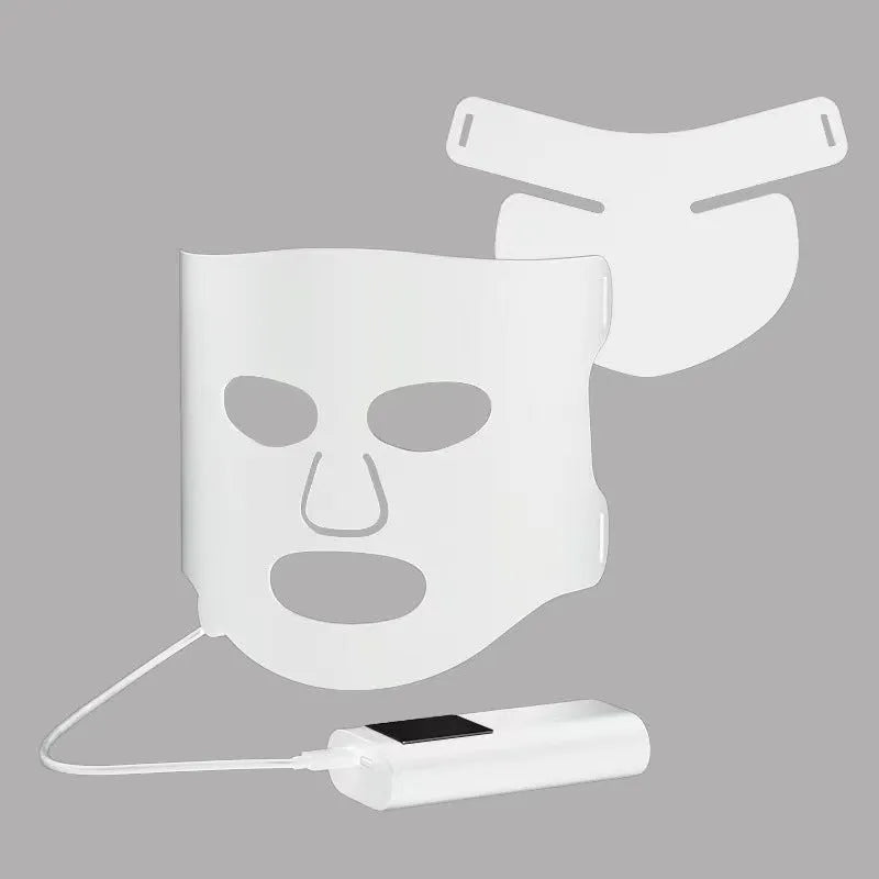 Black and white LED phototherapy face mask with controller for home skin light therapy.