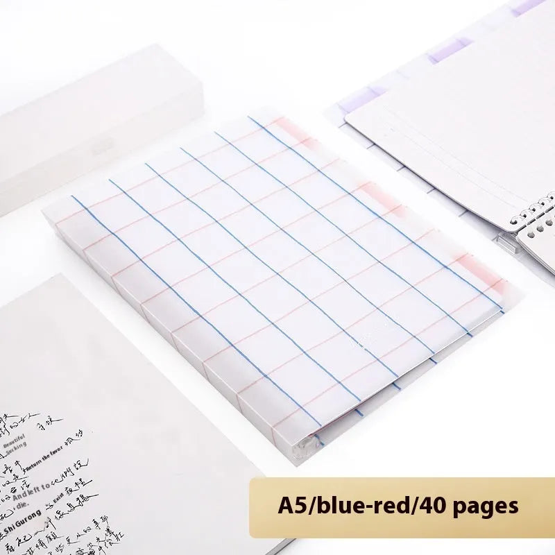 Refillable loose-leaf spiral notebook with PP cover open, showing raw wood pulp paper in grid ruling.