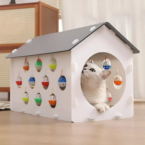 Plastic cat scratch board integrated with cosy nest and tunnel containing bell ball