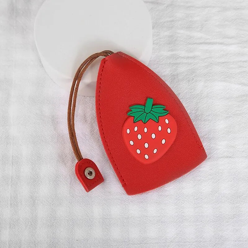 Cartoon design pull-out car key case made from soft PU leather, showing approximate size.