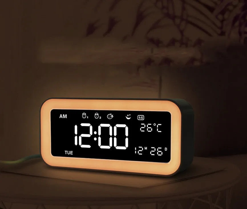 Rectangular blue LED alarm clock with quartz glass display and multicoloured atmosphere lighting functions