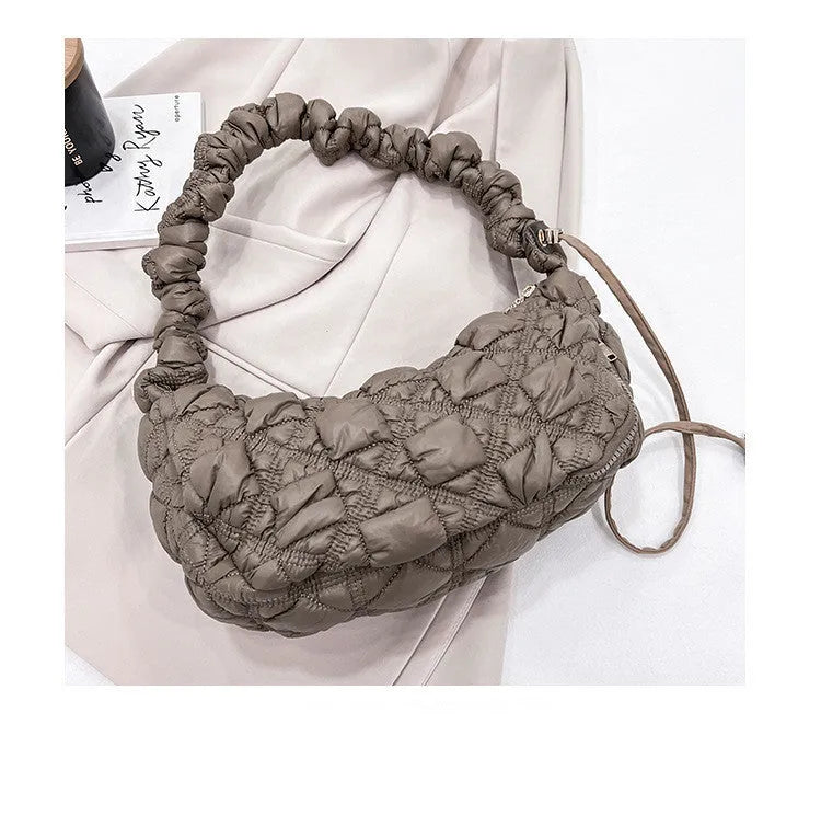 Women's nylon shoulder messenger bag in beige colour showing dimensions and adjustable strap