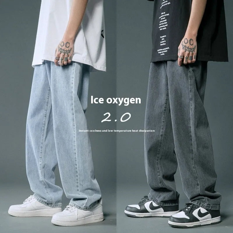 Loose straight cotton denim jeans for men in light blue colour with mid waist and button fly