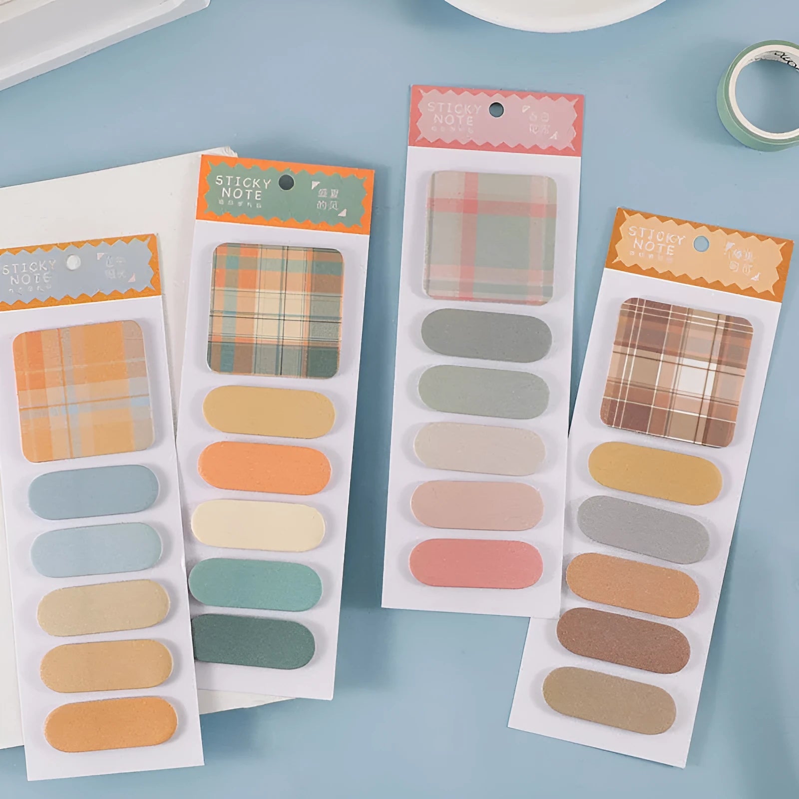 Colourful memo pad set with eight different designs measuring 67mm by 200mm