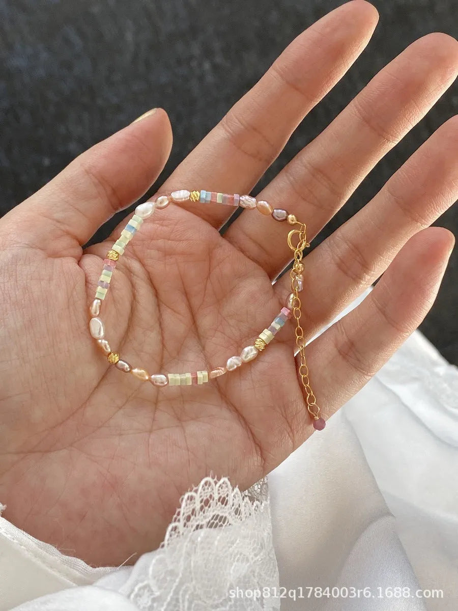 Natural pearl bracelet and necklace set with 14K gold-plating in U-shaped configuration