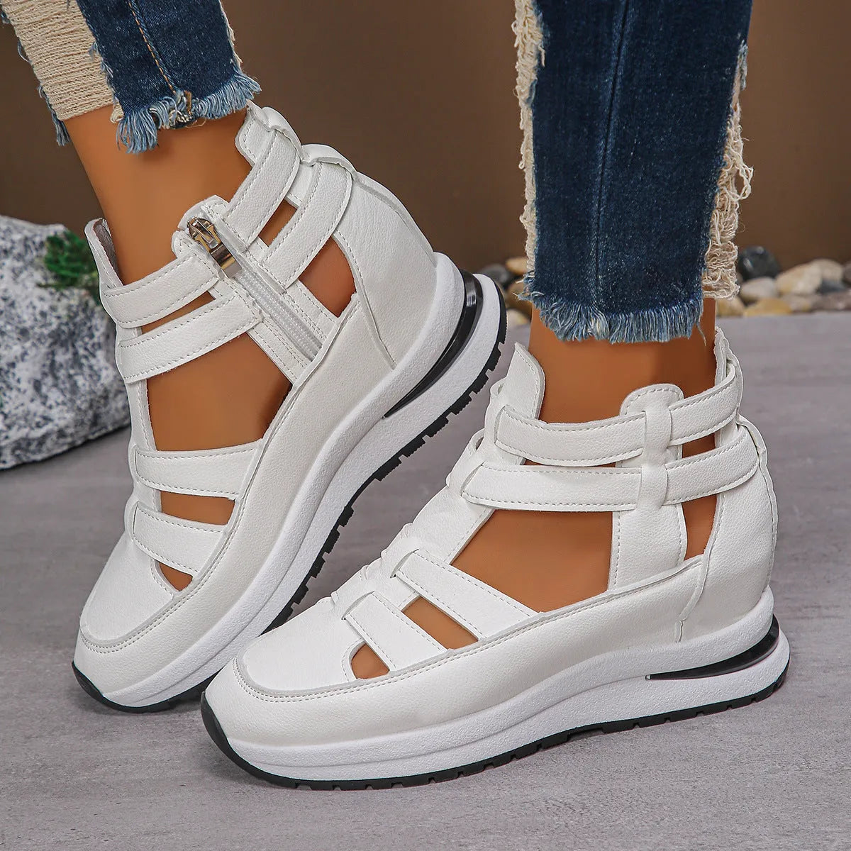 Women's black close-toed platform sandals with Velcro strap and hollow-out design.