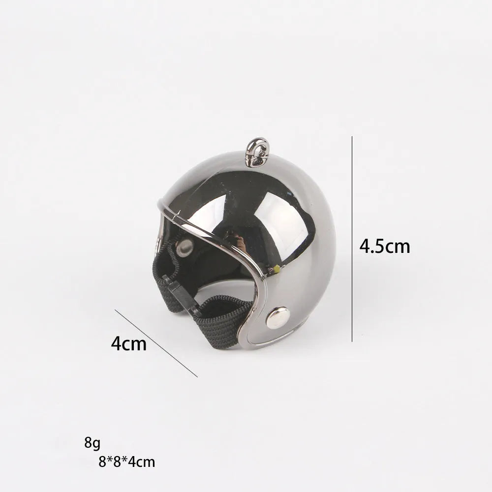Small hard plastic helmet with elastic straps and sponge lining for a chicken or pet bird.