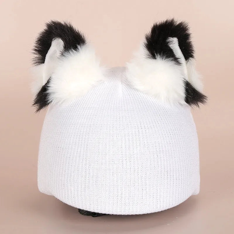 A plush fabric helmet cover with cartoon character ears, shown in size M for bicycle or motorbike use.