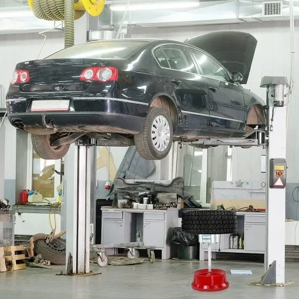 Portable wheel balancer with bull's eye level and aluminium head for 1-1/2" to 4" hubs