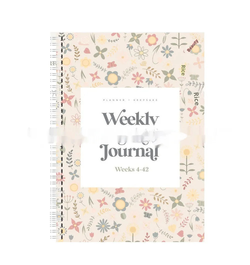 A5 sized weekly pregnancy diary notebook open on a page with the Pregnancy Weekly format