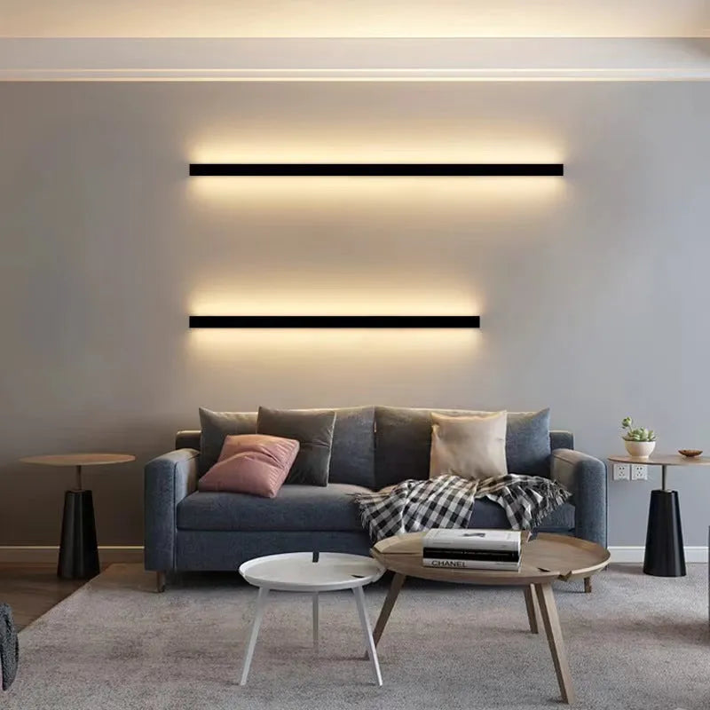 80cm long black LED wall lamp with touch control for three light colours on a white wall.
