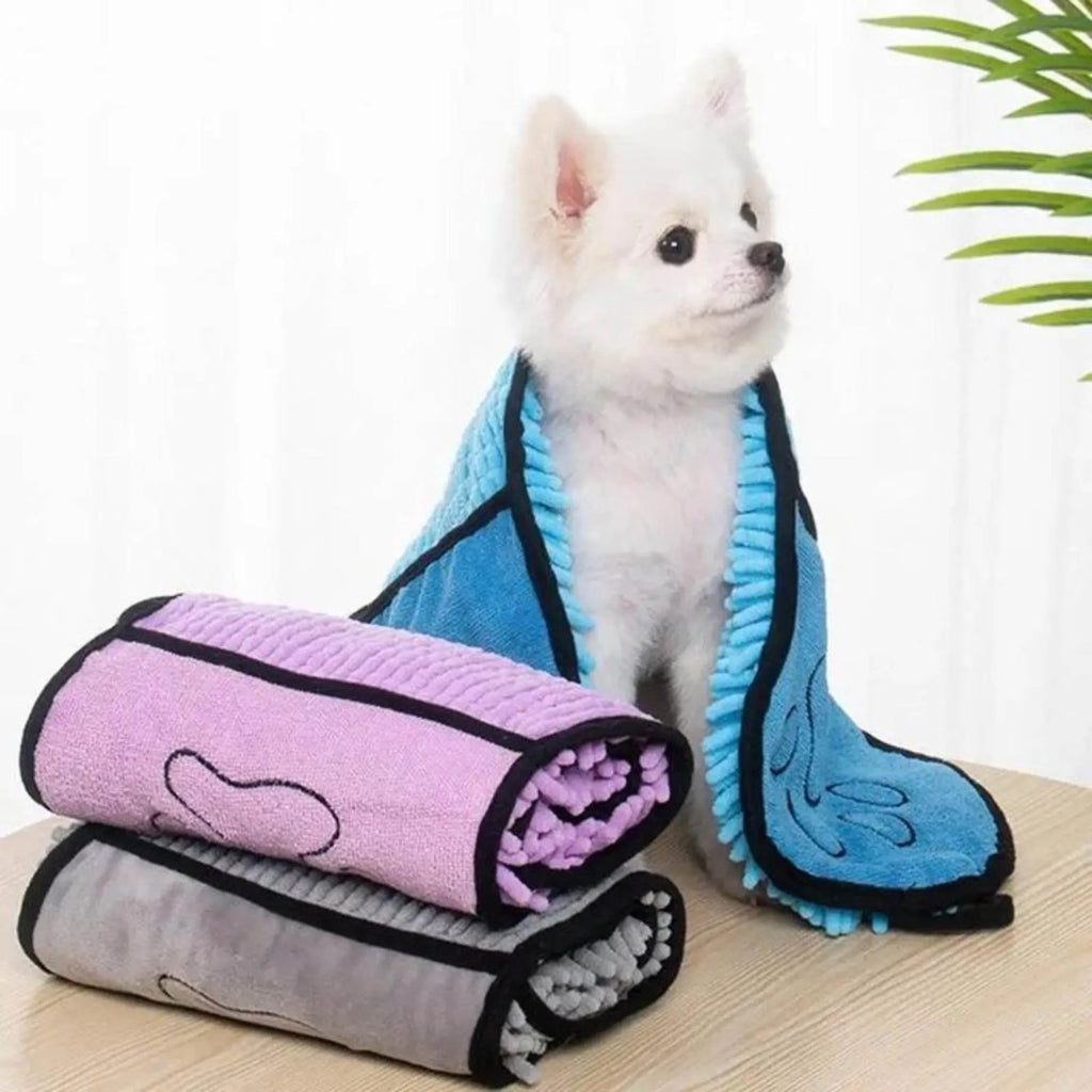 Blue soft fibre pet bath robe towel laid flat, showing its size next to a dog silhouette.