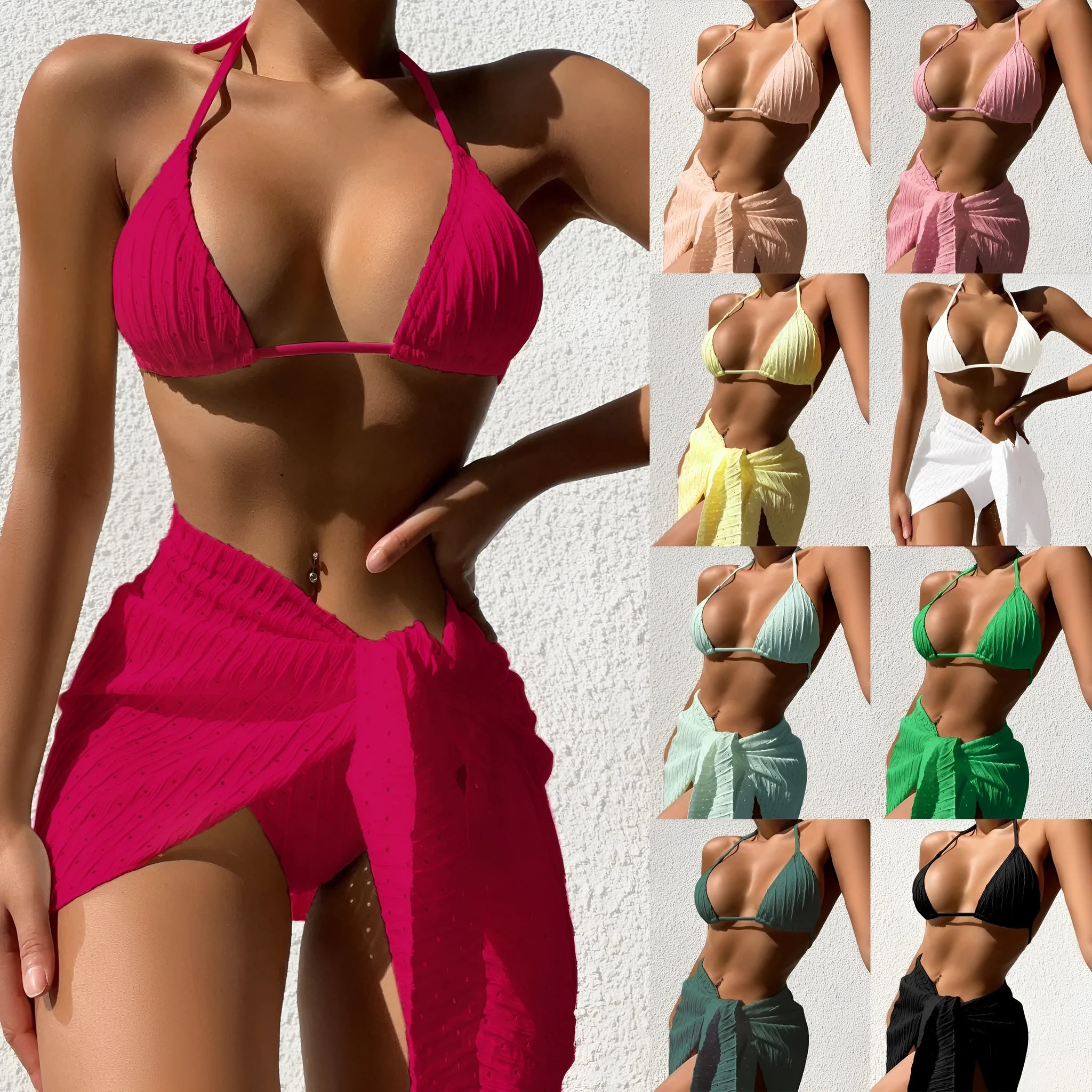 Women's halterneck bikini set in solid colour with matching mesh skirt laid flat