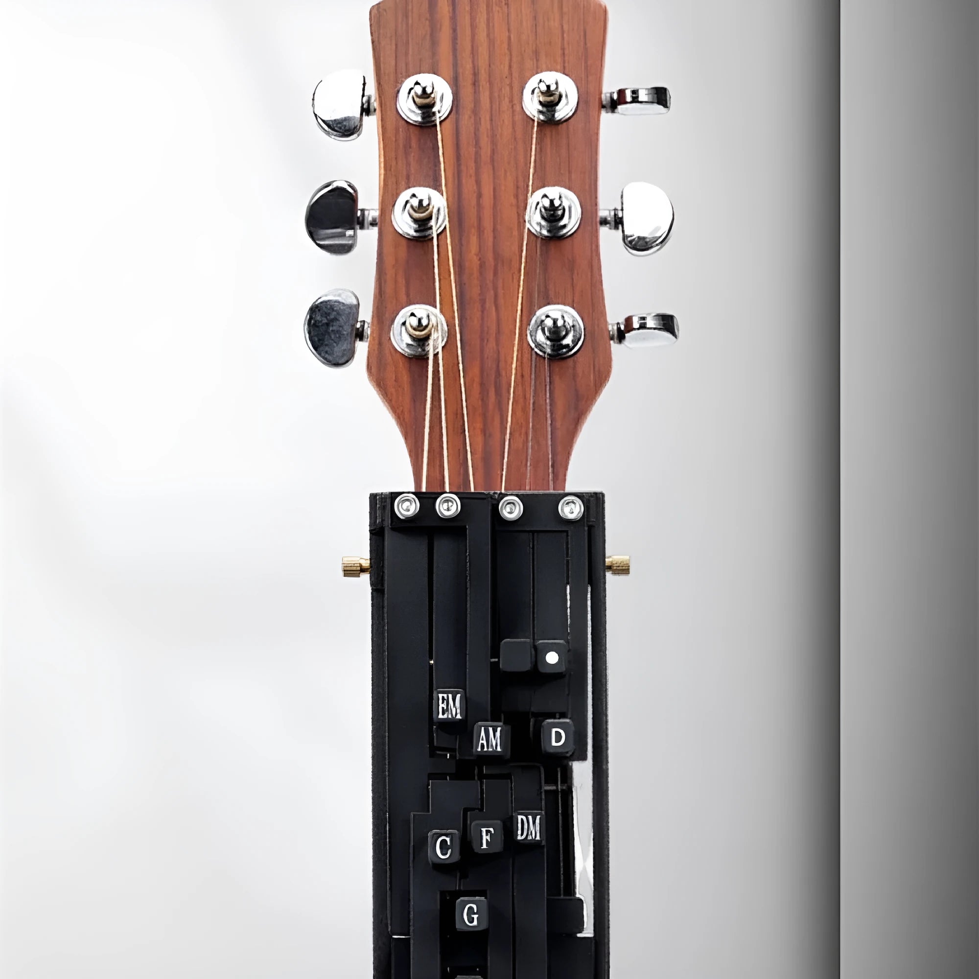 Automatic guitar chord practice device for novice folk guitar players with black chord maker