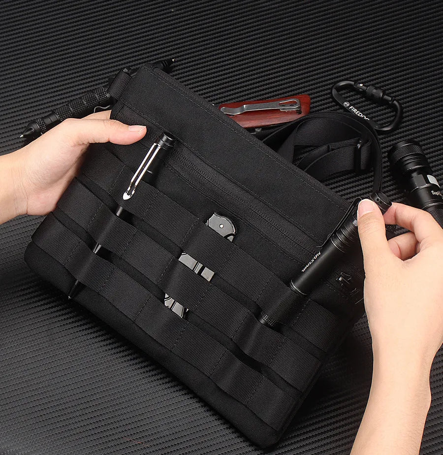 Black Oxford cloth outdoor organiser pouch with compact size for gear organisation.
