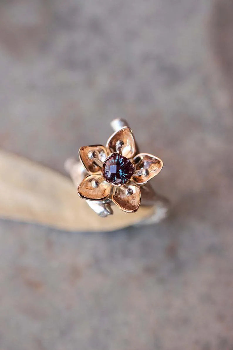 Silver two-tone alloy ring with floral and geometric design for women, showing UK size options.