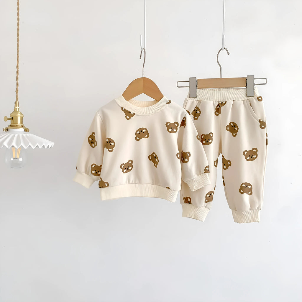 Baby cotton round neck bear cartoon sweater suit in rice apricot with matching trousers