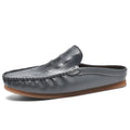 Men's black breathable Gommino semi-slippers with artificial PU upper and rubber sole.