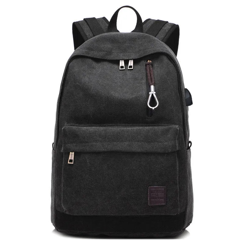 Canvas USB rechargeable backpack with laptop compartment showing multiple storage pockets