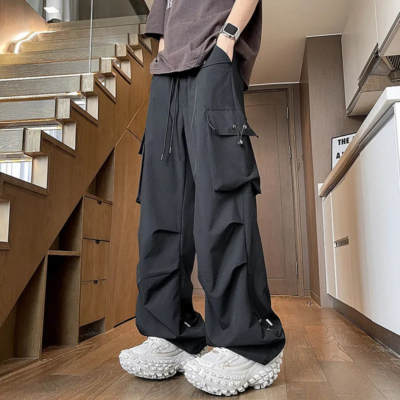 Plus size women's waterproof trousers in straight leg design with drawstring waist